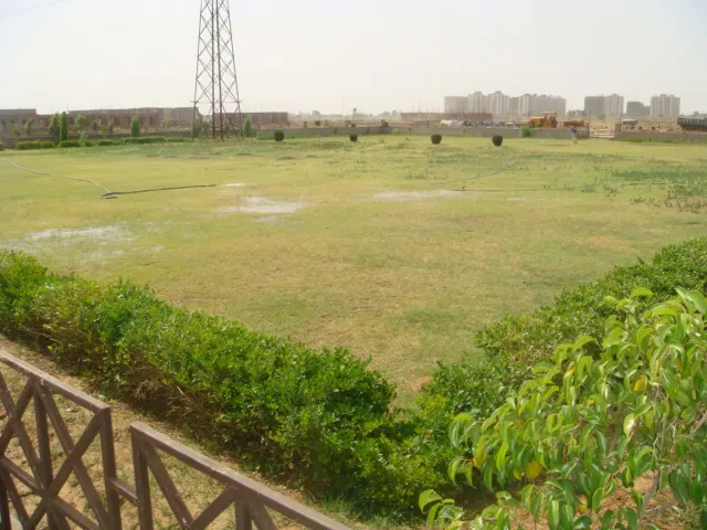 Landscaped park inside Dwarkadhis City, of the kind this corner plot overlooks
