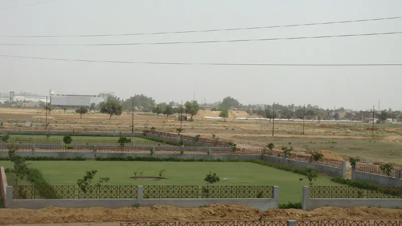 Landscaped plots and green belt inside Dwarkadhis City, Sector 23, Dharuhera
