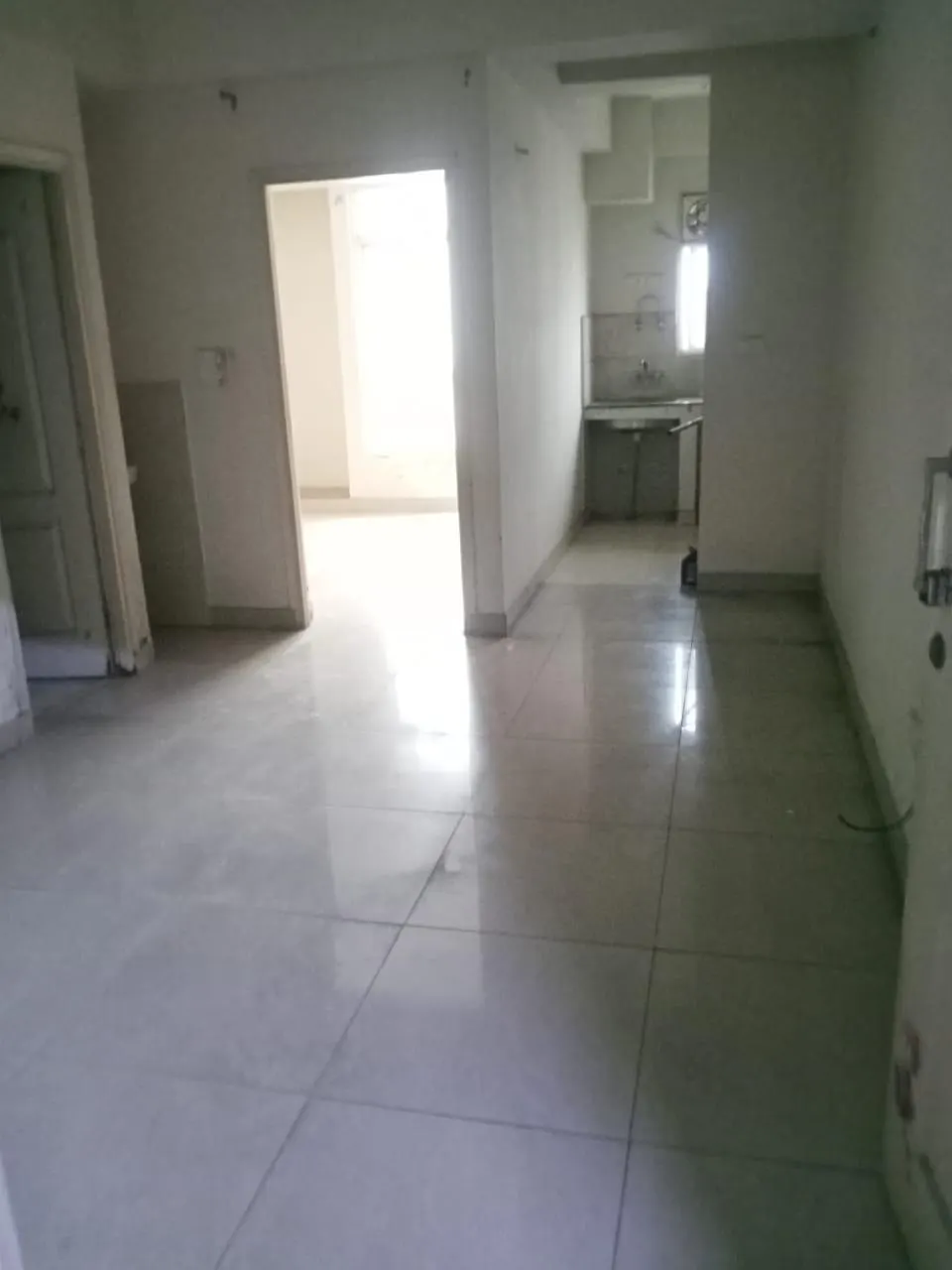 Hallway leading to the kitchen, this 2 BHK flat at Essentia, Bhiwadi