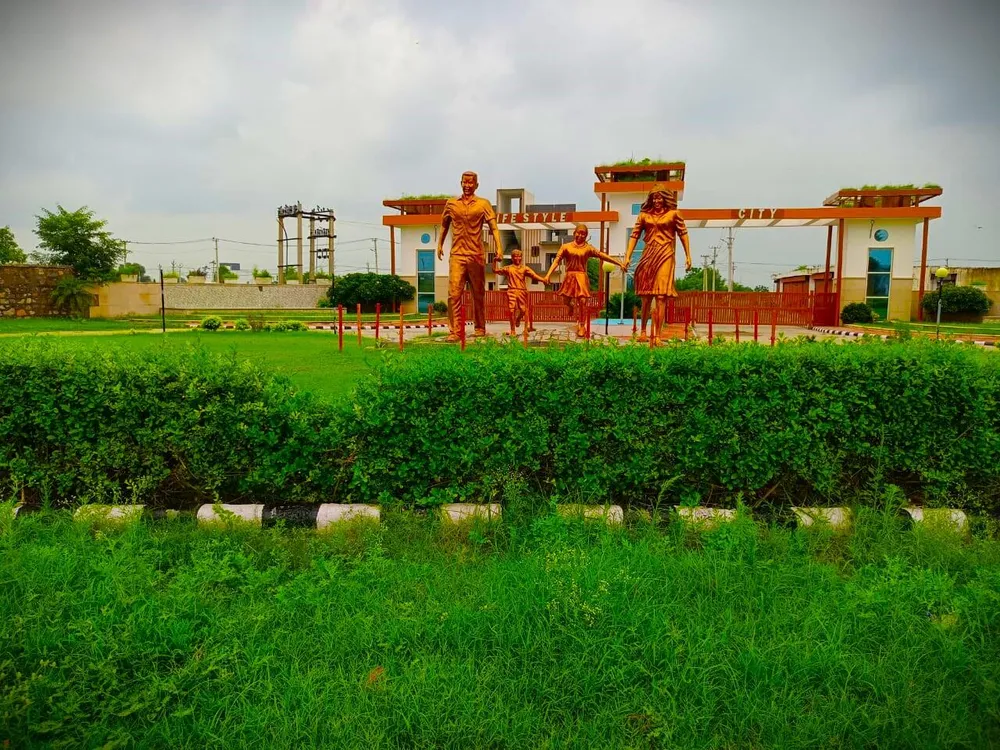 Family sculpture on the lawn in front of the Lifestyle City entrance gate, Alwar Bypass Road, Bhiwadi