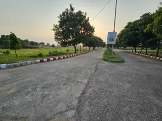 Internal road junction and open plot land in Chanderlok City, Tijara