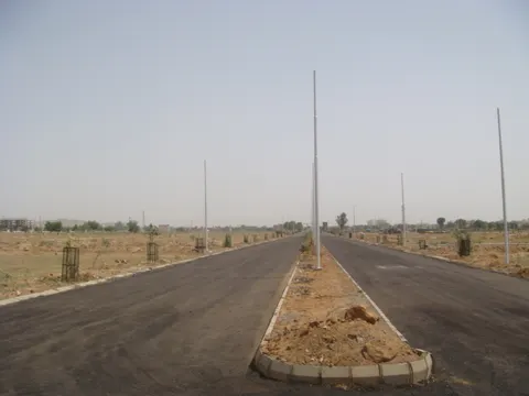 Internal road with streetlights inside Dwarkadhis City