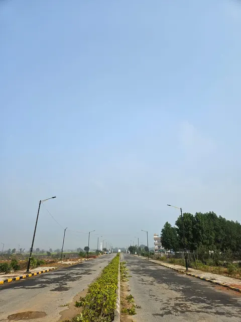 Wide internal road leading towards the water tower, Dwarkadhis City