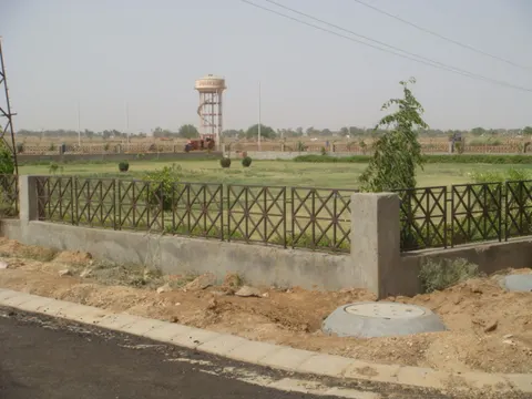 Water tower and park inside Dwarkadhis City, Sector 23, Dharuhera