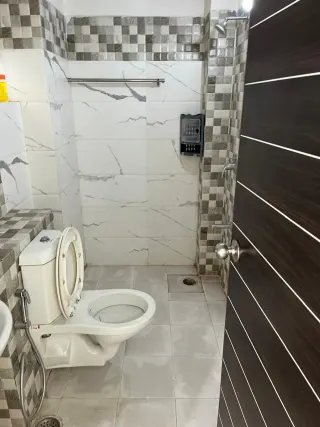 Bathroom, this 2 BHK flat at Essentia, Bhiwadi