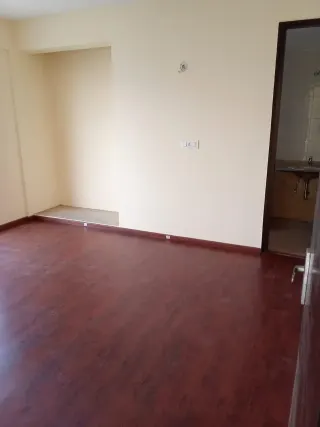 Bedroom with attached bathroom, this 3 BHK flat at HFL Presidency Estate, Bhiwadi