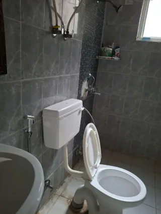 Bathroom, this 2 BHK flat at MVL Coral, Bhiwadi