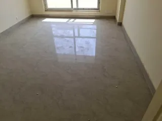 Second bedroom with a wall socket and window, this flat at MVL Coral, Bhiwadi
