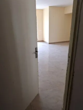 Entrance door opening into the hall, this 3 BHK flat at MVL Coral, Bhiwadi