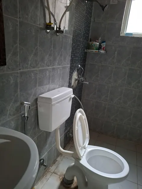 Bathroom, this 2 BHK flat at MVL Coral, Bhiwadi