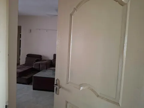 Living room, this 2 BHK flat at MVL Coral, Alwar Bypass Road, Bhiwadi