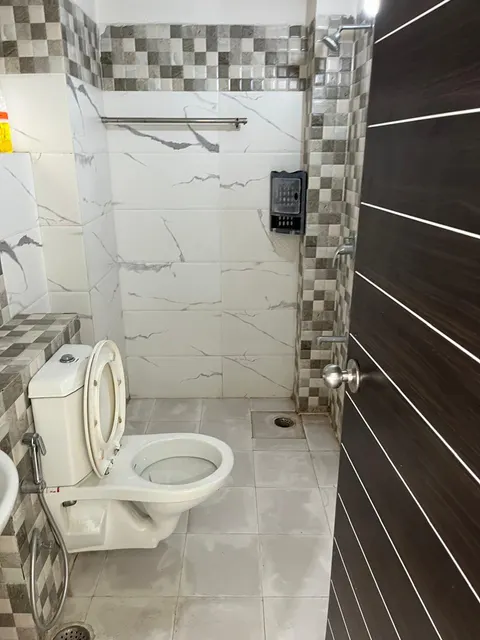 Bathroom, this 2 BHK flat at Essentia, Bhiwadi