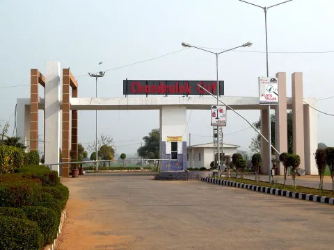 Entry gate, boom barrier and guard cabin at Chanderlok City township, Tijara