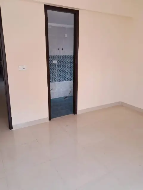 Hall and kitchen passage inside HFL Presidency Estate flat