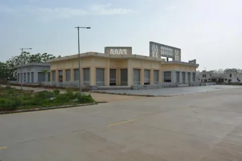 Shop block built along an internal road in Terra City township